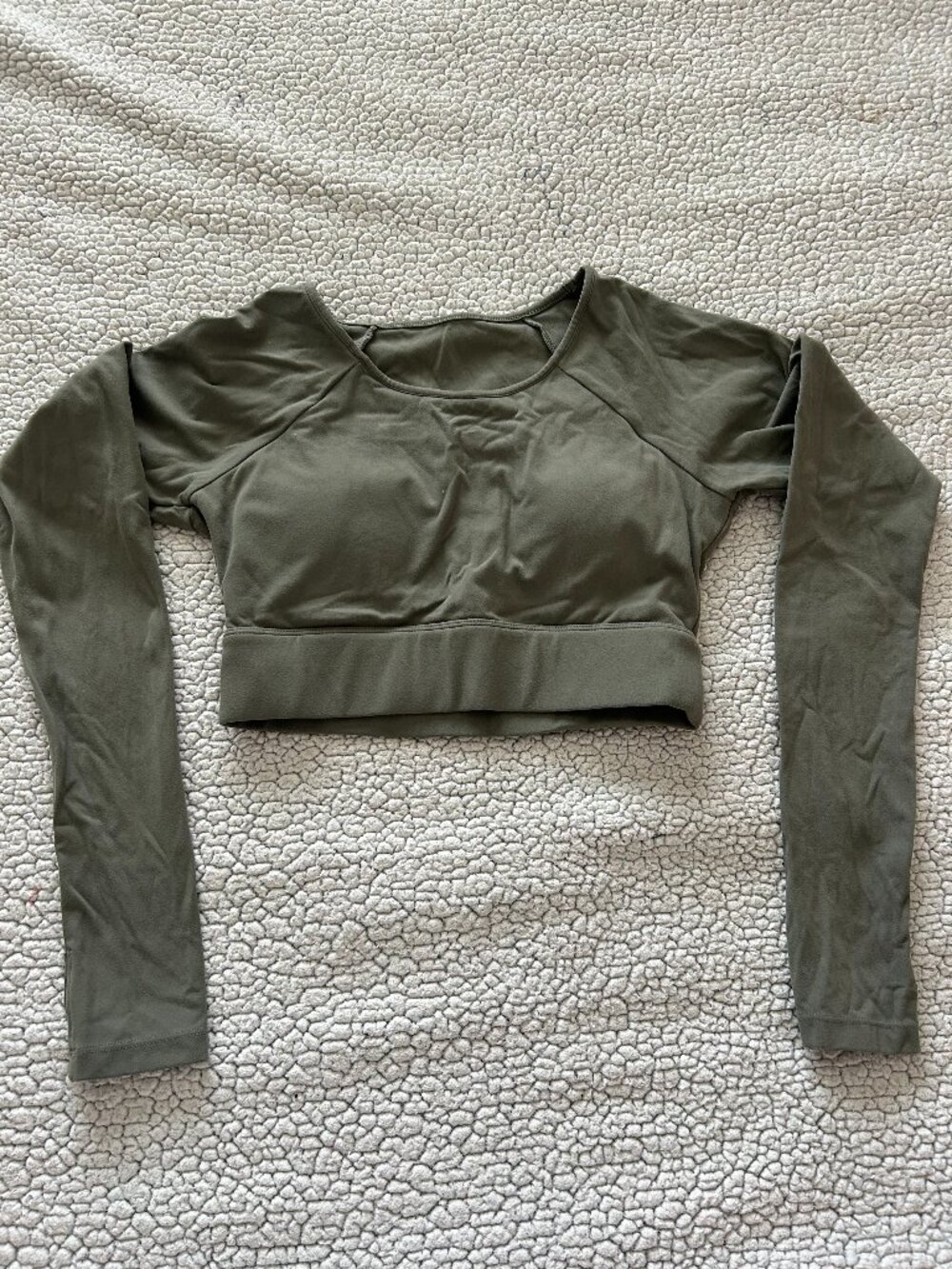 Acta -- green crop athletic long sleeve, back cut out, with thumb holes